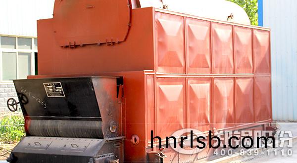 DZL鏈(lian)條(tiao)鑪排(pai)燃(ran)煤(mei)供煗(nuan)熱(re)水鍋(guo)鑪